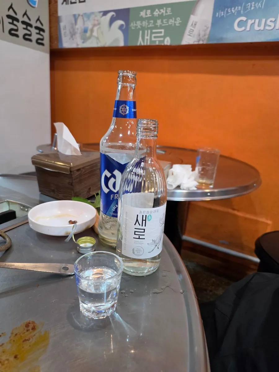 Seoul Jjukkumi, near Nonhyeon Station — webfoot octopus and pork belly on a table pan, ₩16,000 a portion — Seoul Jjukkumi Jamwon