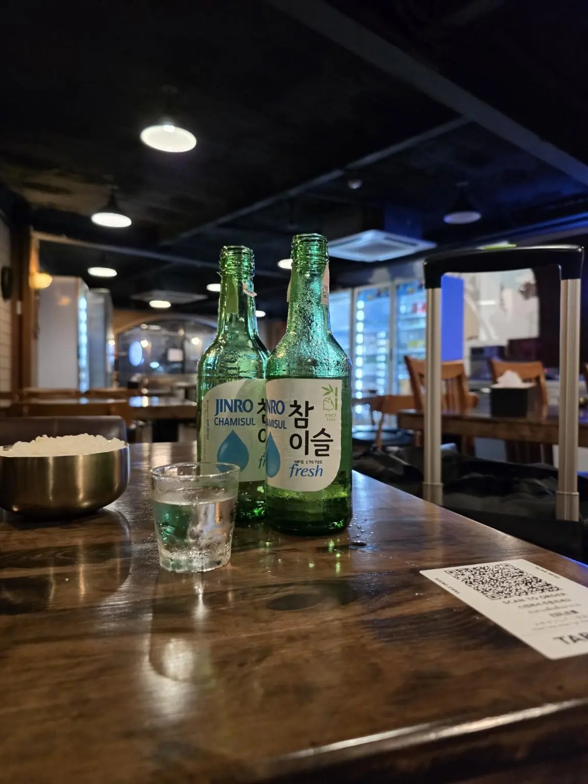 Two bottles of Chamisul and a glass — WuRim Korean Slow Food (우림), Bangkok
