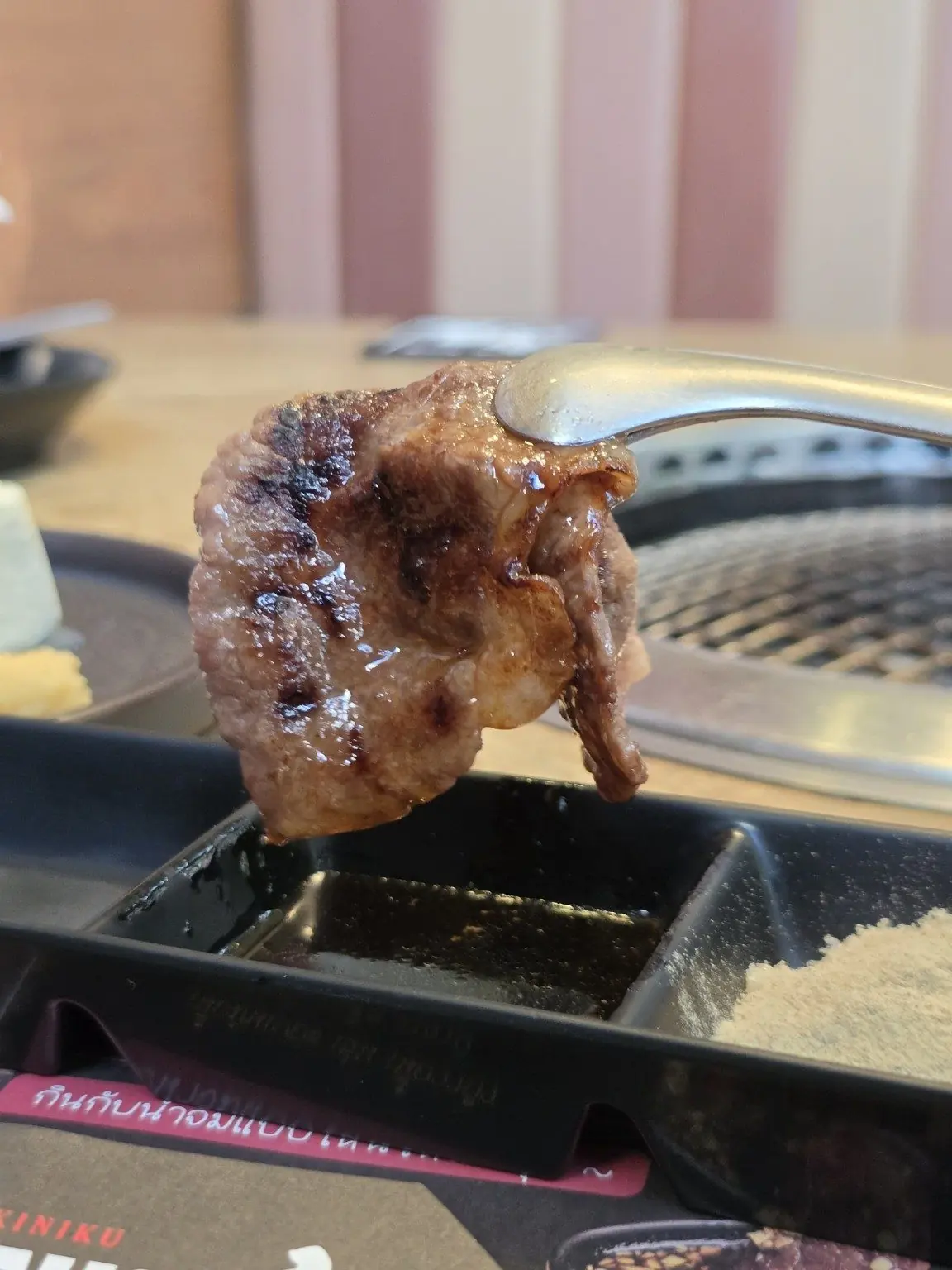 A piece of grilled meat. — Niku Sho, Sukhumvit 31, Bangkok