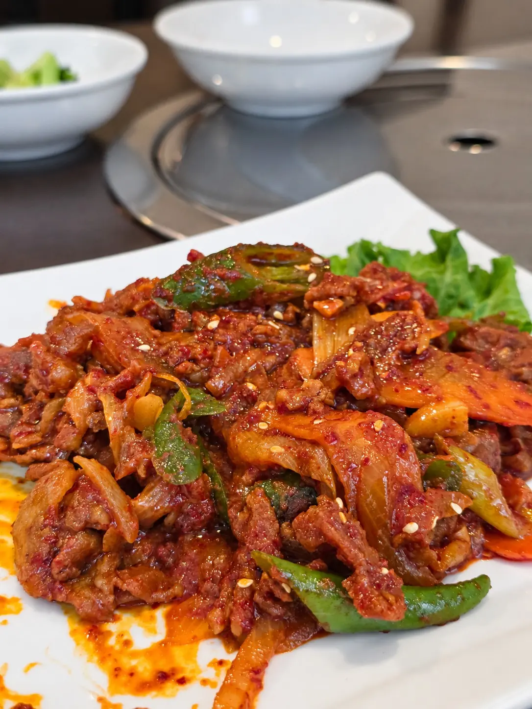 還想再點的韓式炒豬肉。🍽️ — Manchan Korean Restaurant (2nd floor), Phrom Phong, Bangkok