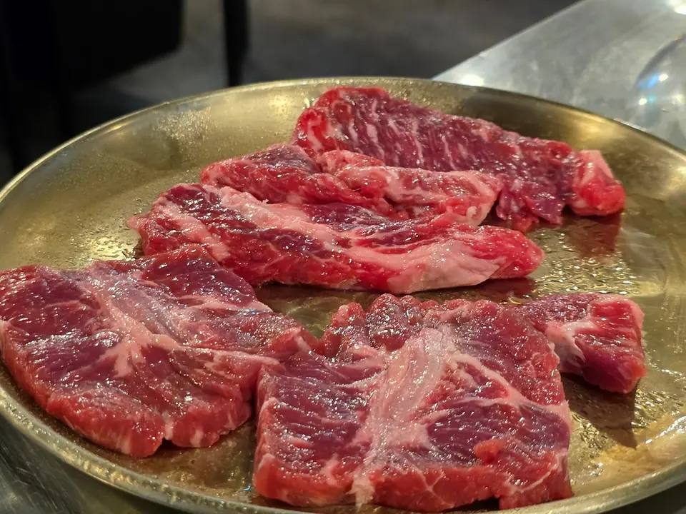 Raw galbisal on a steel tray at Banpo Galbi, Express Bus Terminal